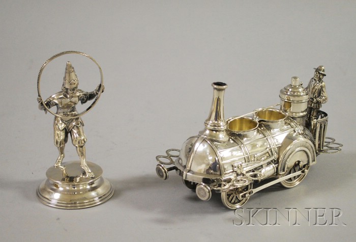 Appraisal: Two Austro-Hungarian Silver Decorative Items a steam work train with