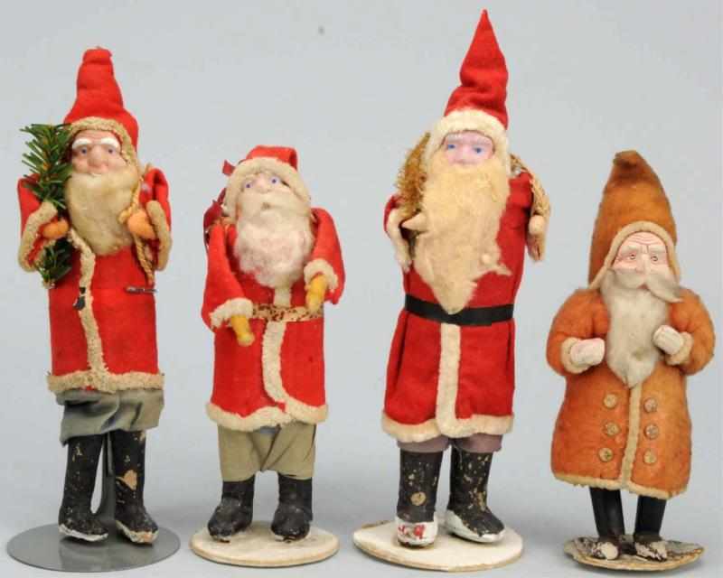 Appraisal: Lot of Santas with Composition Faces Japanese Condition Excellent Size