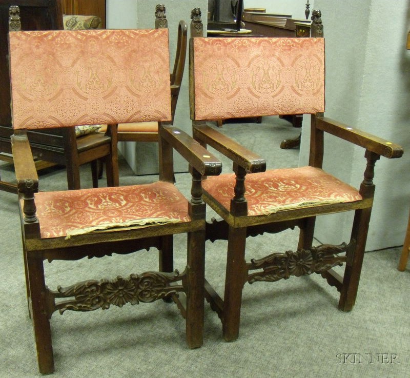 Appraisal: Pair of th Century Spanish-style Upholstered Carved Walnut Armchairs