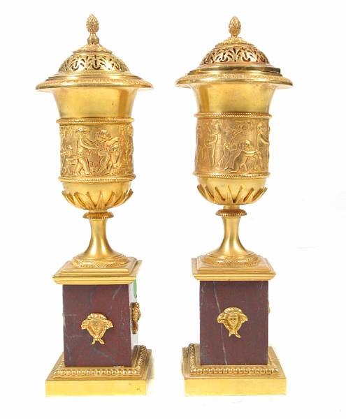 Appraisal: A pair of Empire style gilt bronze and marble cassoulettes