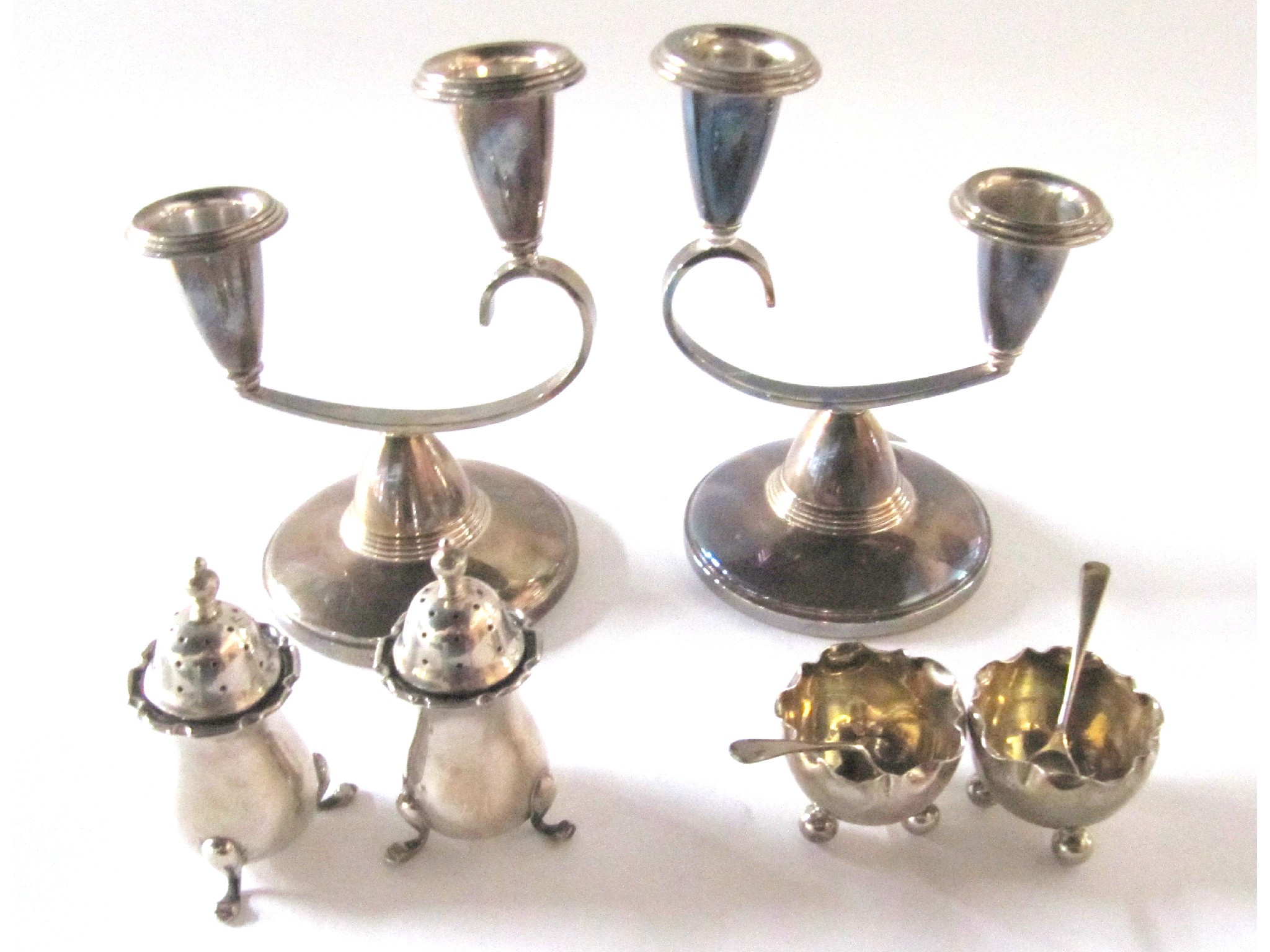 Appraisal: A lot comprising a pair of silver -branch candle holders