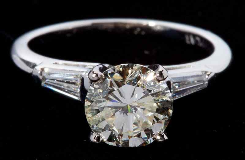 Appraisal: Platinum and Diamond Solitairecentering on one round brilliant cut diamond