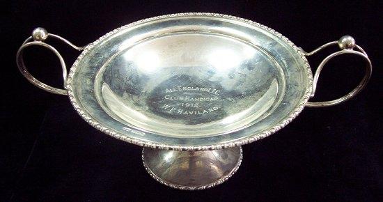 Appraisal: A circular two-handled trophy cup with egg and dart border