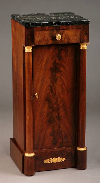 Appraisal: An Empire gilt metal mounted mahogany bedside cabinet early th