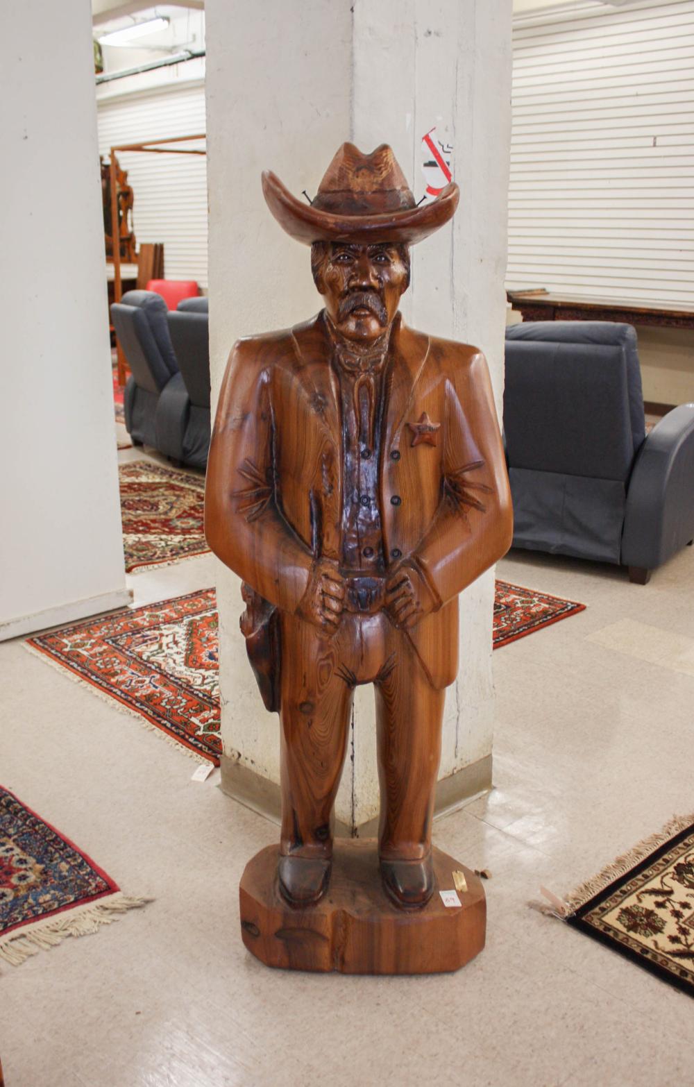 Appraisal: GARY THOMPSON United States st century carved wood sculpture Sheriff