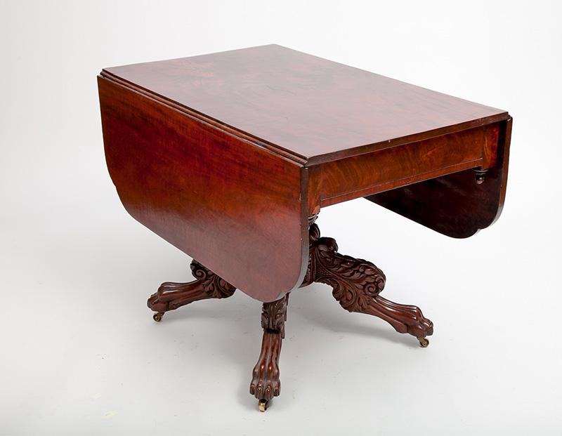 Appraisal: Late Federal Carved Mahogany Drop-Leaf Table The foliate-carved pedestal on