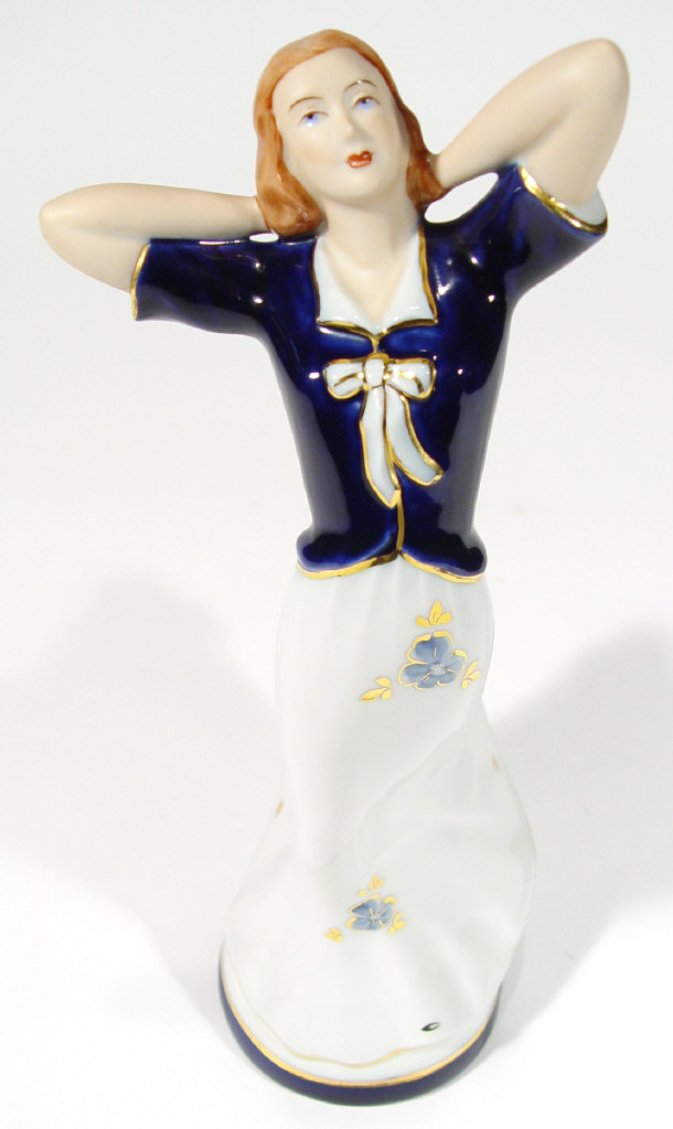 Appraisal: Royal Dux porcelain figurine in a blue painted flowing dress