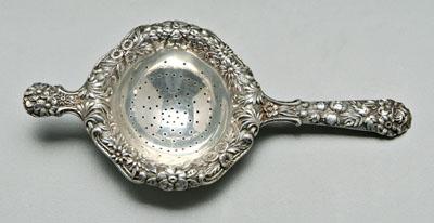 Appraisal: Kirk Repouss tea strainer one long handle one lugged handle