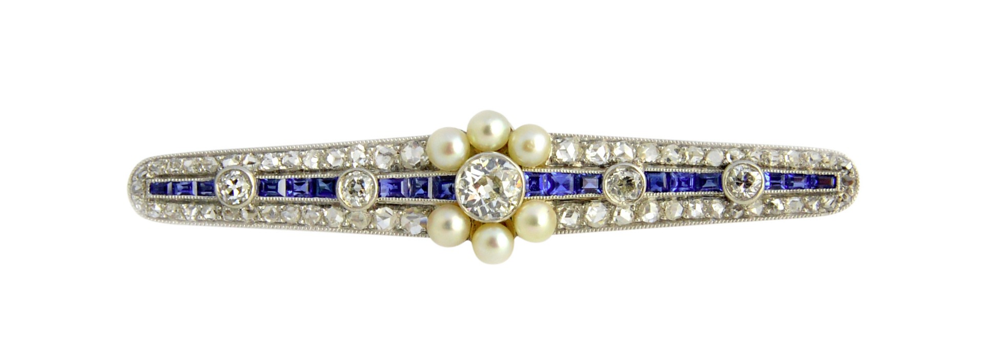 Appraisal: A diamond sapphire and seed pearl brooch in a tapered