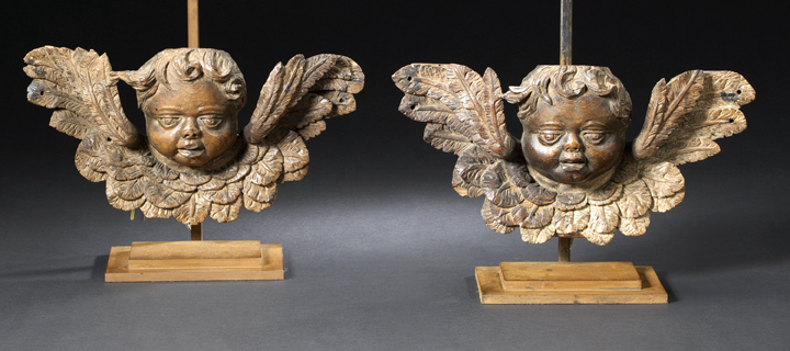 Appraisal: Pair of Continental Baroque Carved Oak Winged Putto Masques first