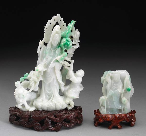 Appraisal: Two mottled jadeite figural groups Both possibly depicting Guanyin the