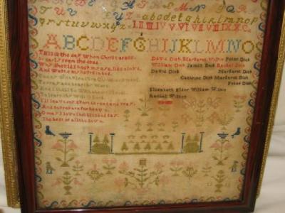 Appraisal: A VICTORIAN WOOLWORK SAMPLER with alphabet stanza and list of