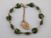 Appraisal: A carat gold and nephrite jade bracelet the jade alternately