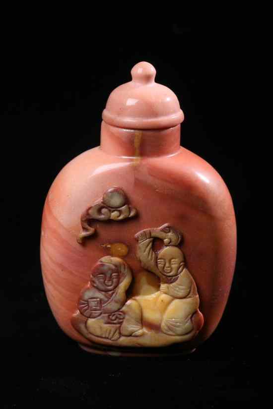 Appraisal: CHINESE SALMON AND YELLOW JADE SNUFF BOTTLE Flattened ovoid-form carved