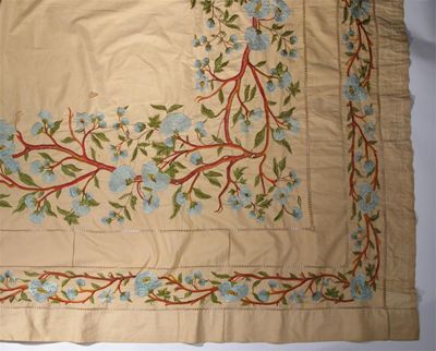 Appraisal: A silk embroidered tablecloth decorated to the edge and centre