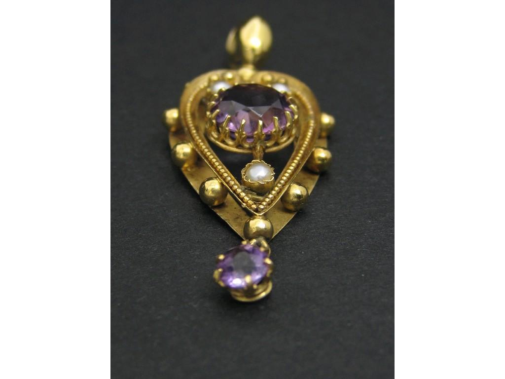 Appraisal: An Amethyst and seed Pearl Pendant claw-set circular amethyst in