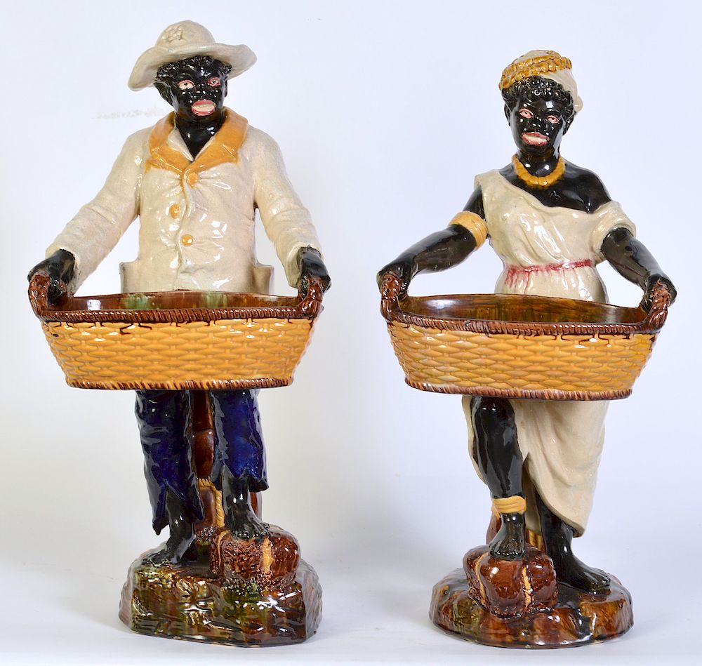 Appraisal: Large English Ceramic Blackamoor Figurines English painted ceramic blackamoor figures