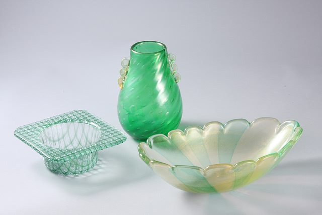 Appraisal: Green vase with controlled bubbles bowl with spruzzato banding together