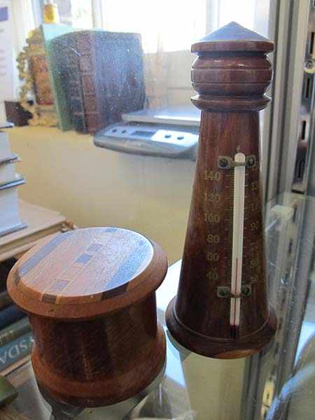 Appraisal: TASMANIAN LIGHTHOUSE SHAPED THEROMETER AND SPECIMEN WOOD BOX