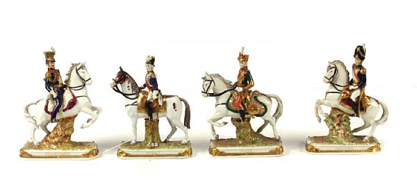 Appraisal: A group of four German porcelain figures on horses one