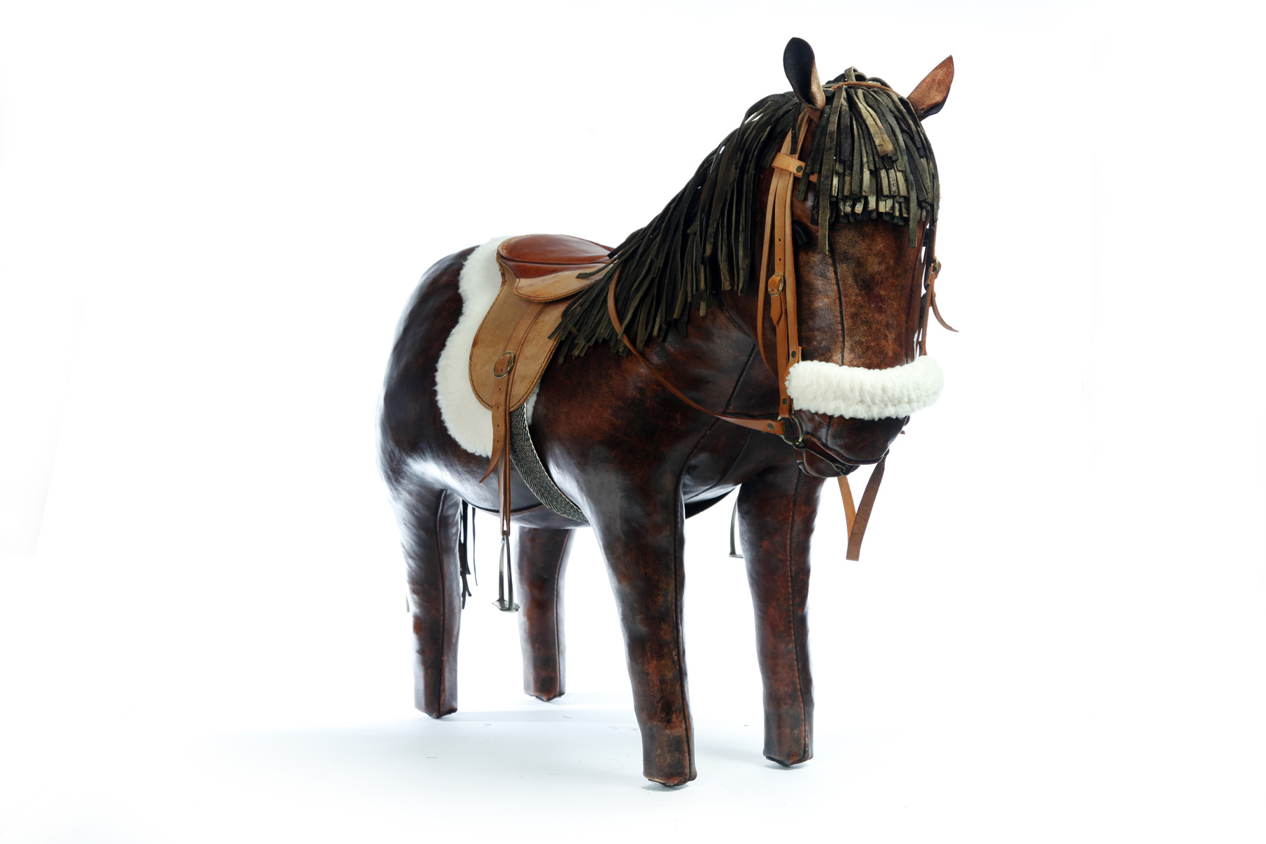 Appraisal: LEATHER HORSE FOOTSTOOL BY DIMITRI OMERSA FOR ABERCROMBIE FITCH United