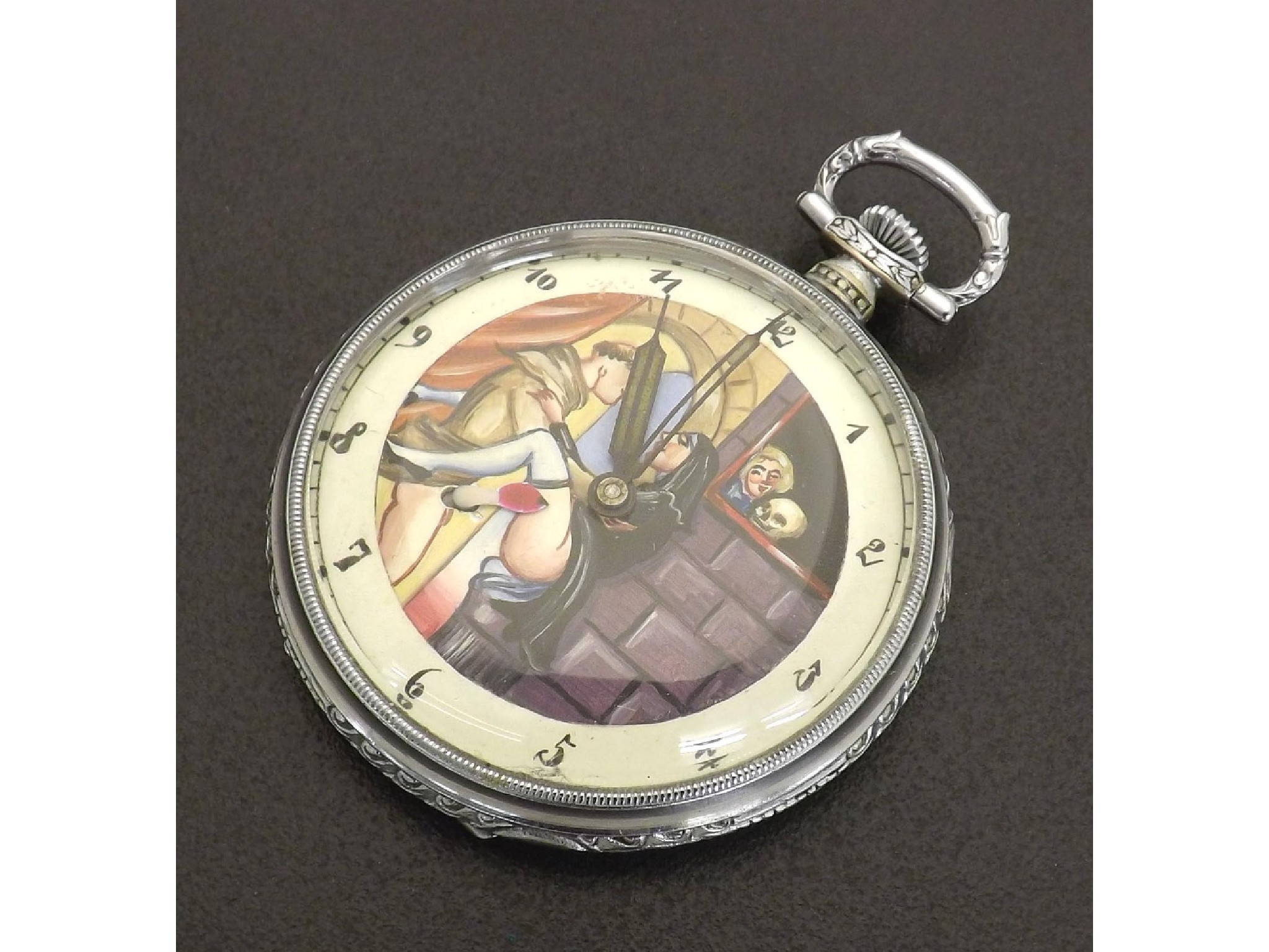 Appraisal: Novelty chrome erotic automaton pocket watch lever movement the dial