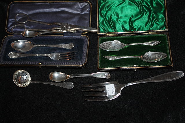 Appraisal: A CASED SILVER CHRISTENING SET a pair of cased spoons