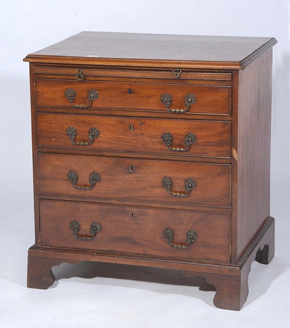 Appraisal: A MAHOGANY SMALL STRAIGHT FRONT CHEST of four drawers with