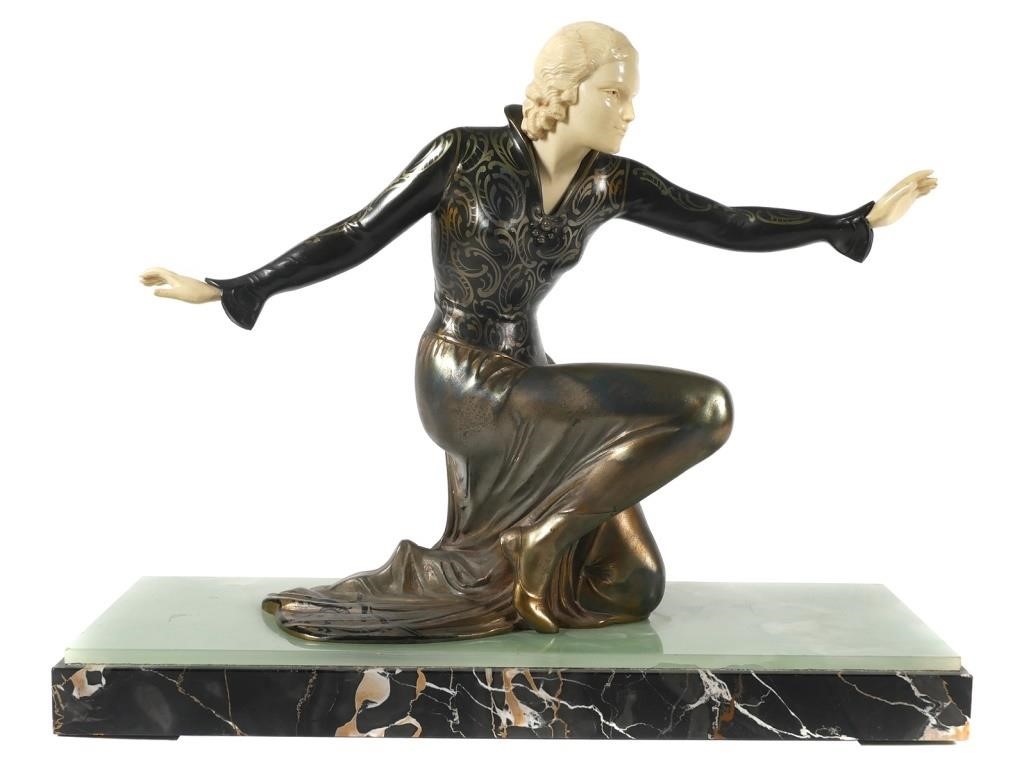 Appraisal: Art Deco period patinated and cold painted bronzed metal figure