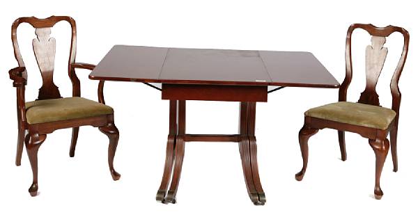 Appraisal: An English mahogany dining room set comprising a table with