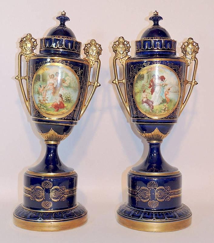 Appraisal: Two Royal Vienna Porcelain Urns On stands Each featuring a