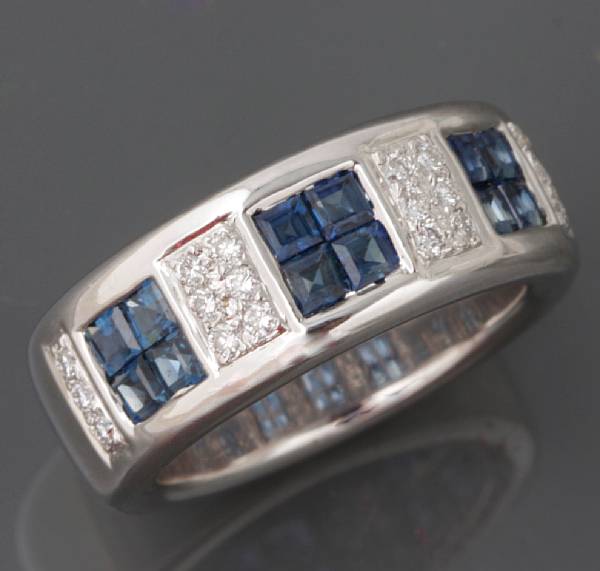 Appraisal: A diamond sapphire and k white gold band