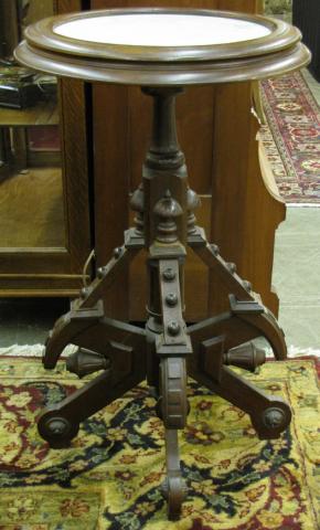 Appraisal: Victorian walnut wine table with inset marble top very ornate