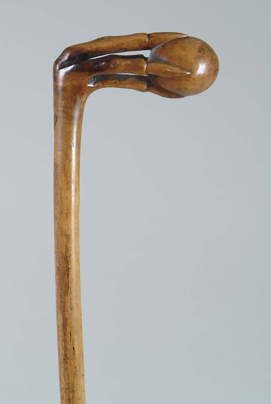 Appraisal: CANE CARVED WOOD TALON AND BALL CANE L-shaped wood cane