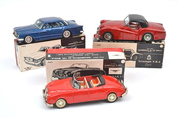 Appraisal: THREE BANDAI JAPAN FRICTION TINPLATE MODELS INCLUDING CHRYSLER VALIANT SEDAN