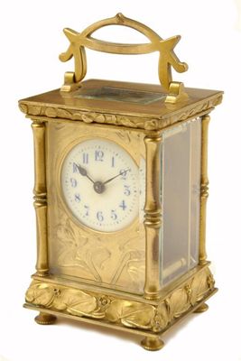 Appraisal: A French Art Nouveau gilt brass carriage clock with a