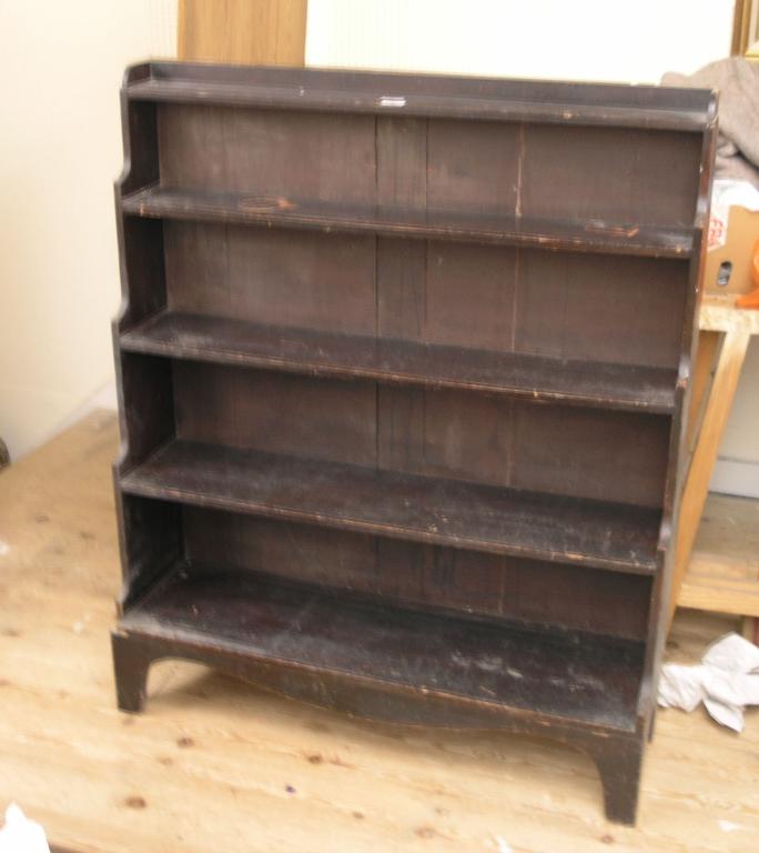 Appraisal: A grained pine 'Waterfall' bookcase five fitted shelves ft in