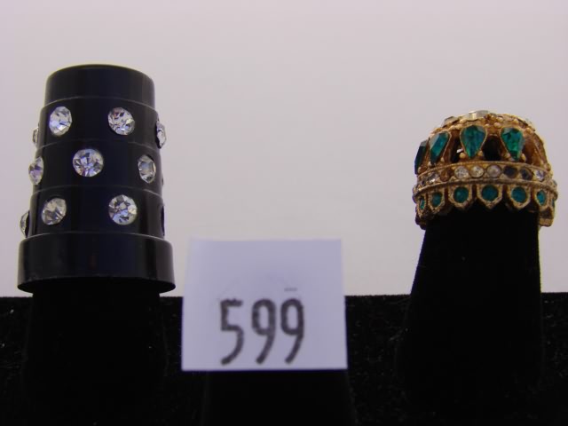 Appraisal: Lot of thimbles One black with clear stone design one