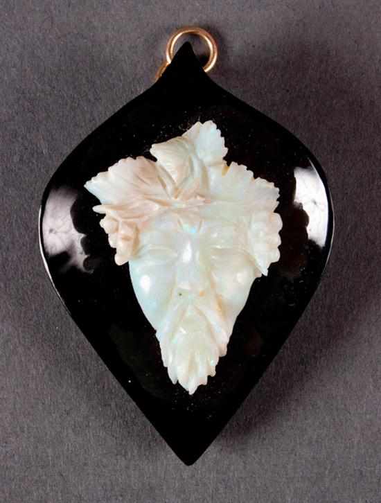 Appraisal: Chinese onyx and carved opal leaf-form brooch in L in