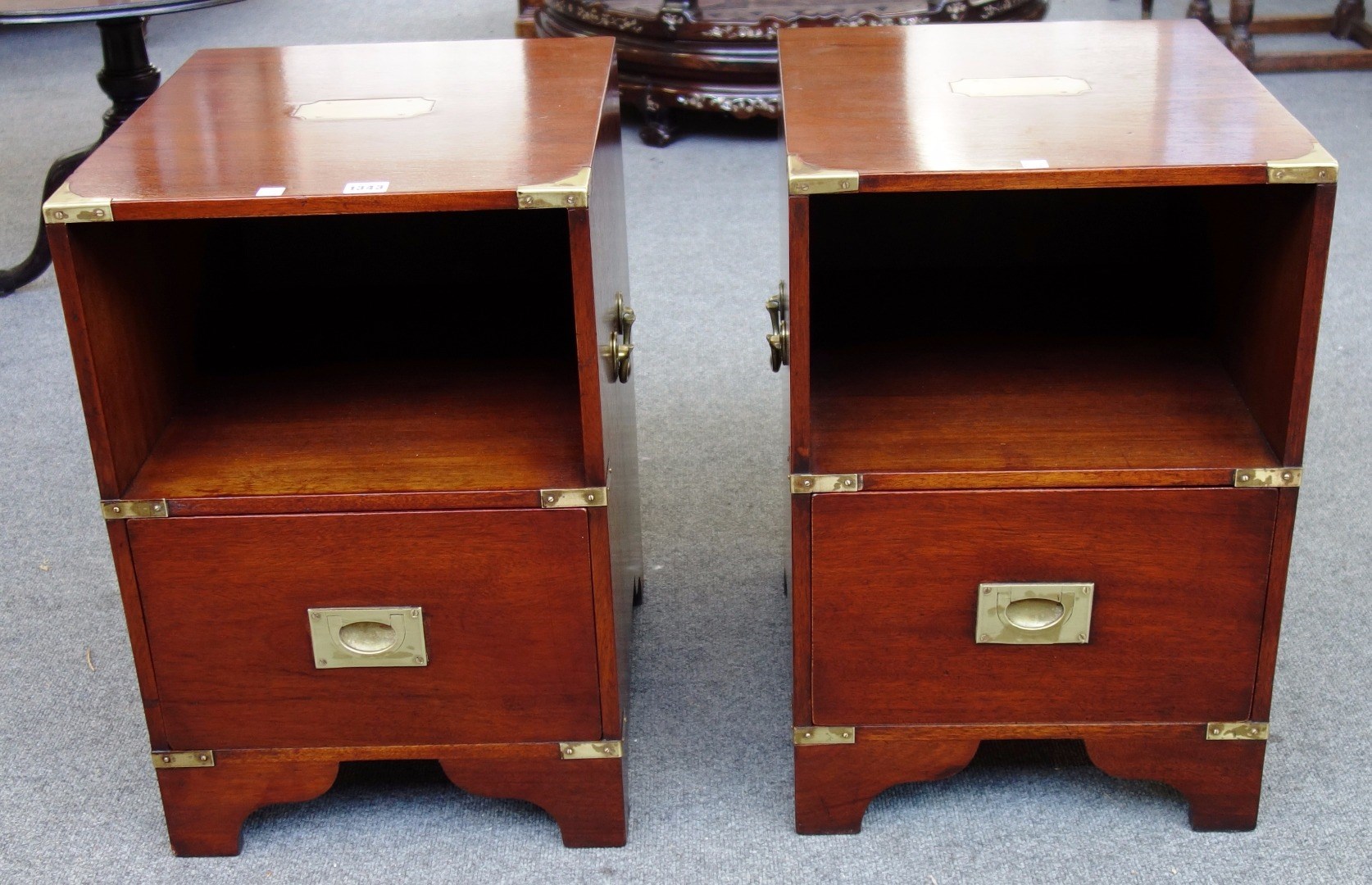 Appraisal: A pair of th century brass banded mahogany campaign style