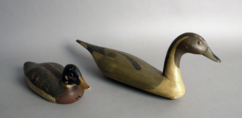 Appraisal: Two carved and painted duck decoys l and l