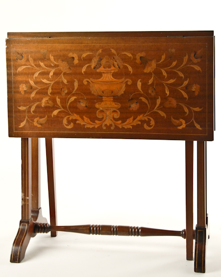 Appraisal: A Marquetried Sutherland Table with string urn floral and foliate