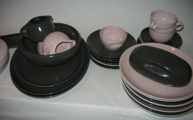 Appraisal: RUSSEL WRIGHT Pink and grey glazed pottery dinner service comprising