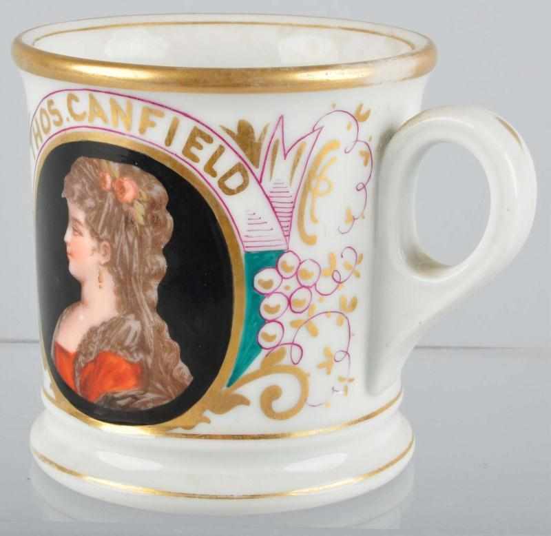 Appraisal: Profile of Lady Shaving Mug Description Marked Thos Canfield across