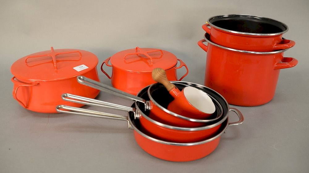 Appraisal: Eleven piece lot of red enameled pots and pans three