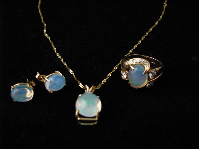 Appraisal: K Yellow Gold Jelly Opal Suite including pendant with three