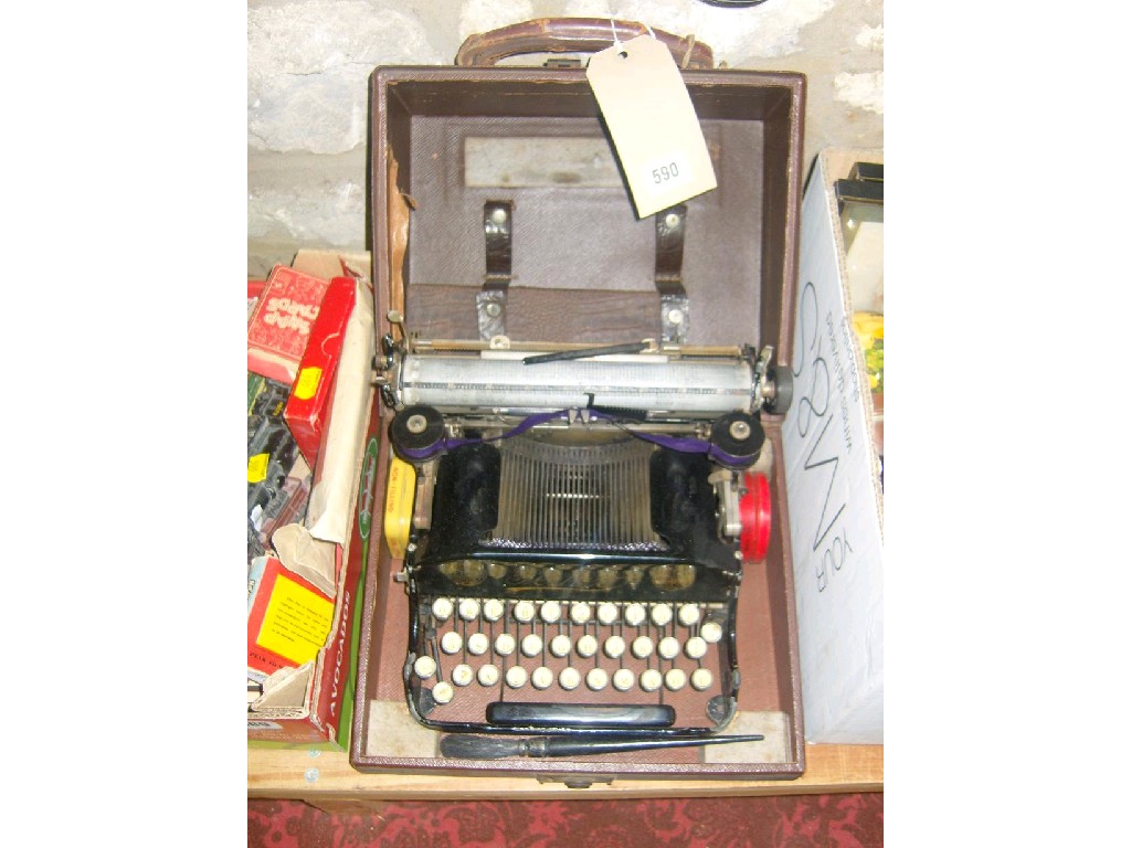 Appraisal: A Vintage travelling typewriter with enamelled finish by Perkeo