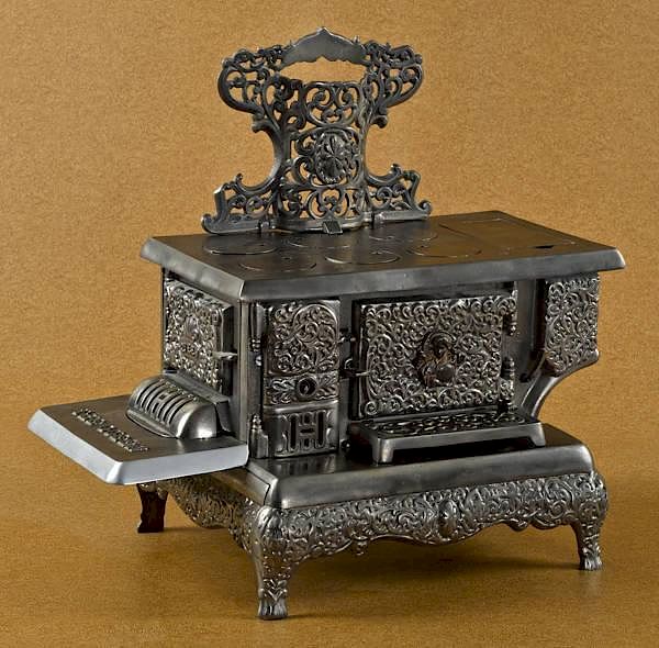 Appraisal: Dent cast iron and nickel The Queen toy stove Dent