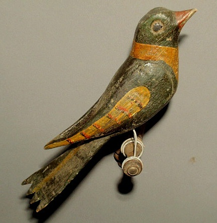 Appraisal: German folk art carved bird-on-stand with polychrome decoration l