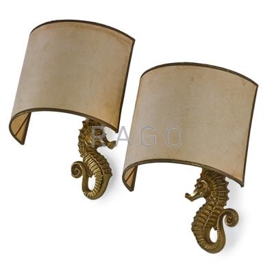 Appraisal: FRENCH Pair of seahorse sconces France s Bronze paper shades